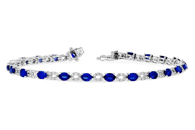 Women’s statement bracelet-14K White Gold 9.70ctw Oval Blue Sapphire & Diamond Tennis Bracelet by Allison Kaufman