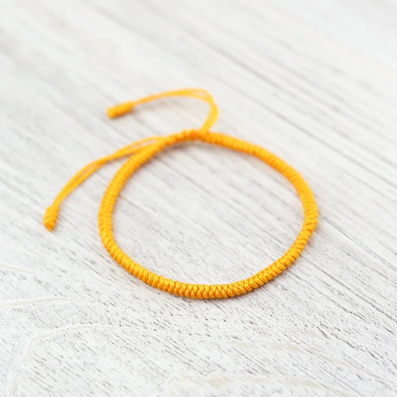 Women’s chic statement bracelet-Tibetan Traditions Yellow Knotted Bracelet