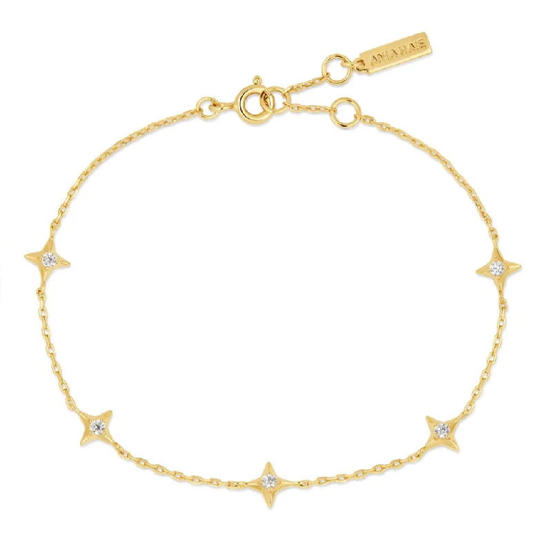 Women’s iconic bangle-Sterling Silver & 14K Yellow Gold Plated Cubic Zirconia Star Station Bracelet by Ania Haie